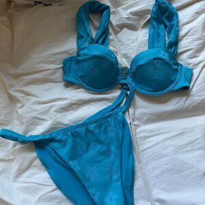 retro style bikini set in minimalist floral print. Top Size small with Medium Bo